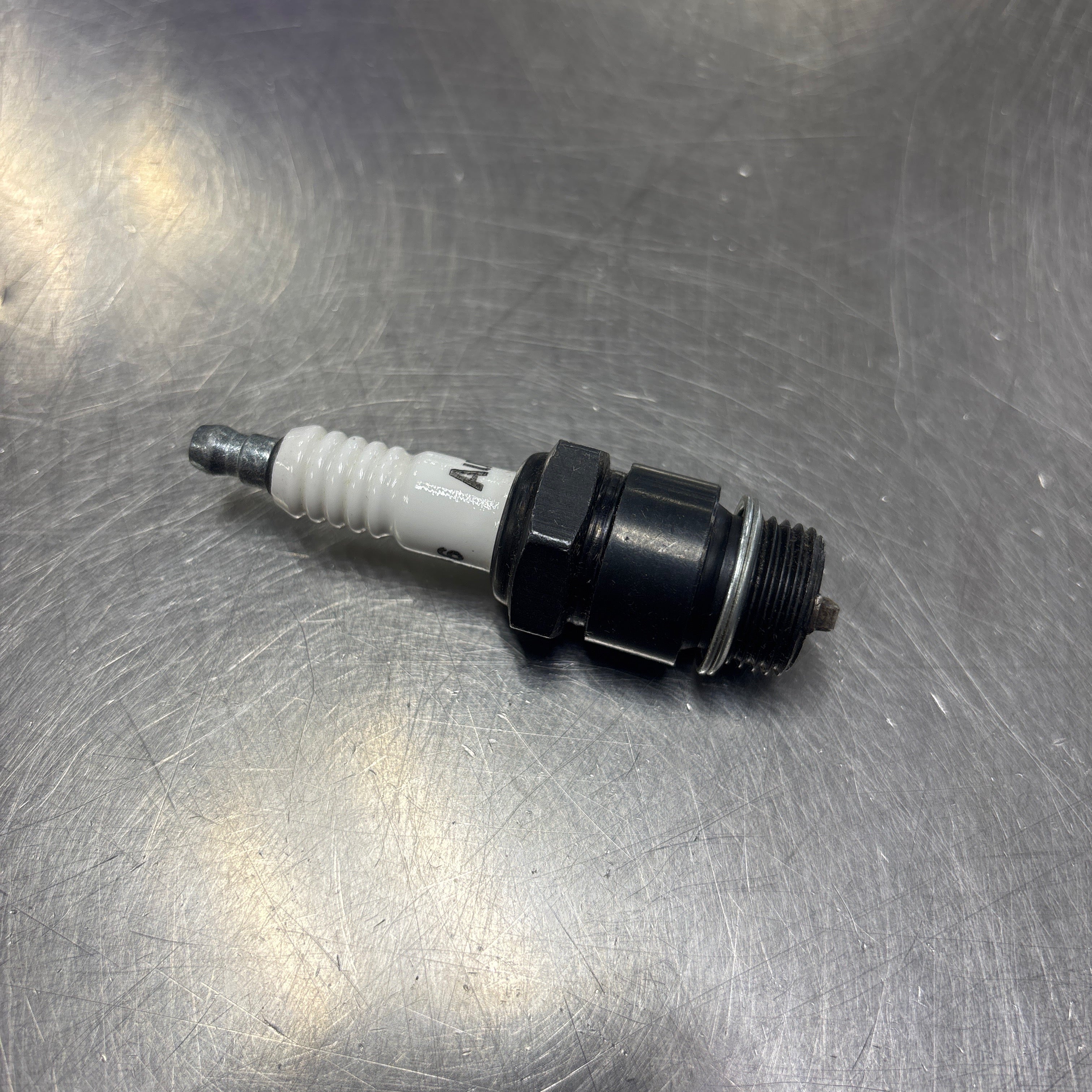 bobcat spark plug for loaders 890272